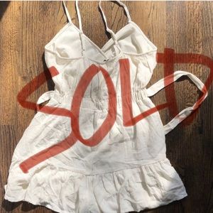 American Eagle cream colored v-neck  belted romper size Medium